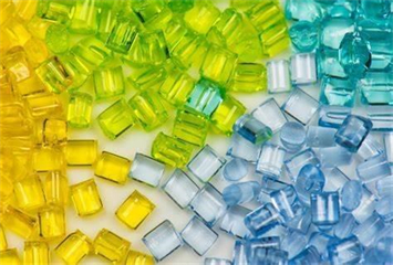 What are the reasons and solutions for black spots on the surface of plastic products?